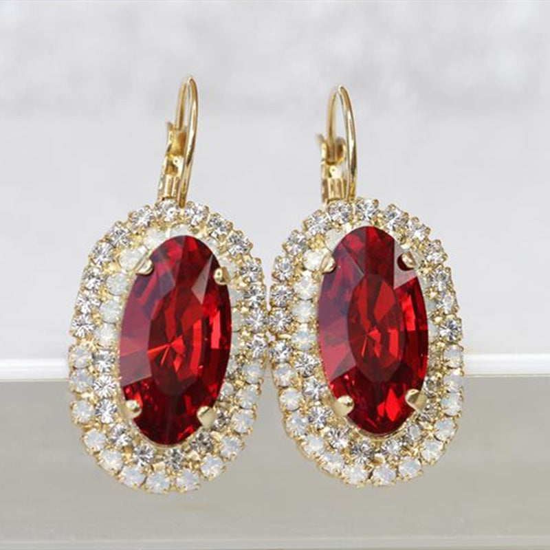 Golden Red Oval Gemstone And White Diamond Earrings