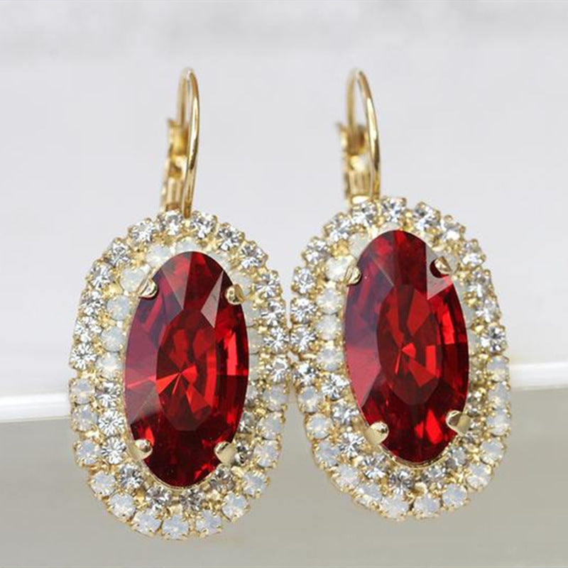 Golden Red Oval Gemstone And White Diamond Earrings